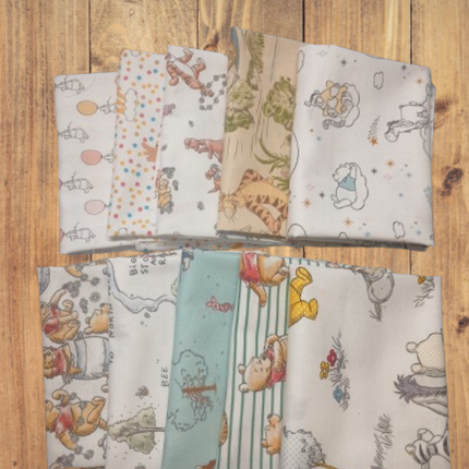 Assorted Pooh and Friends Flat Fold Assortment 20 Yard Bundle Cotton Fabric