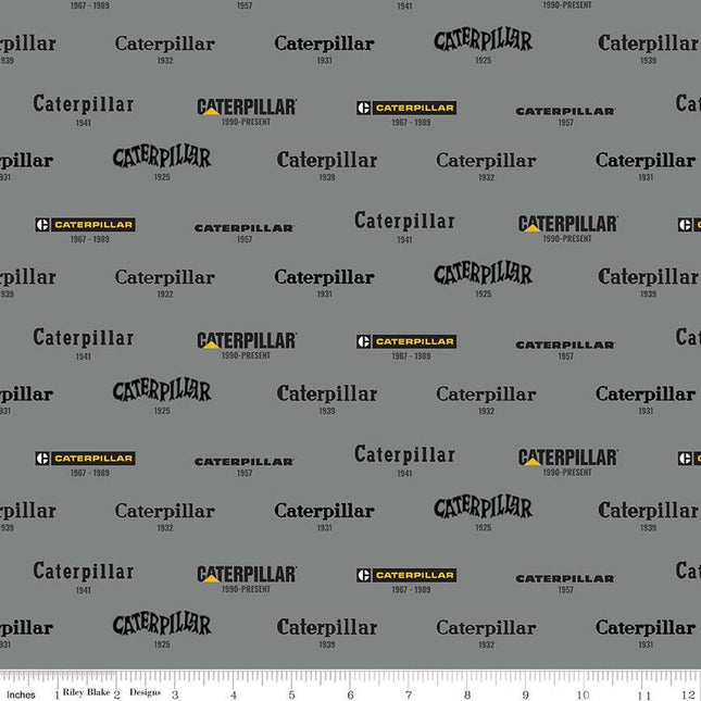 Caterpillar® 100 Years Vintage Logos Gray Cotton Fabric