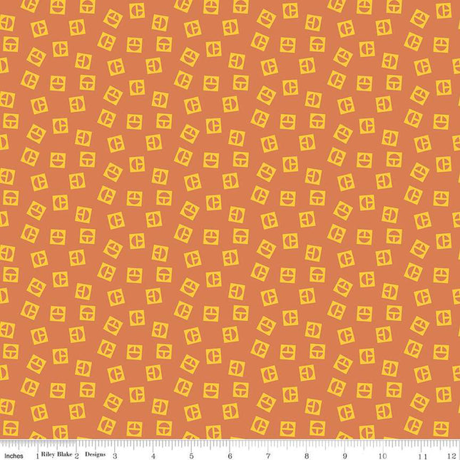 Vintage Caterpillar® Vintage Logo Toss Orange Cotton Fabric