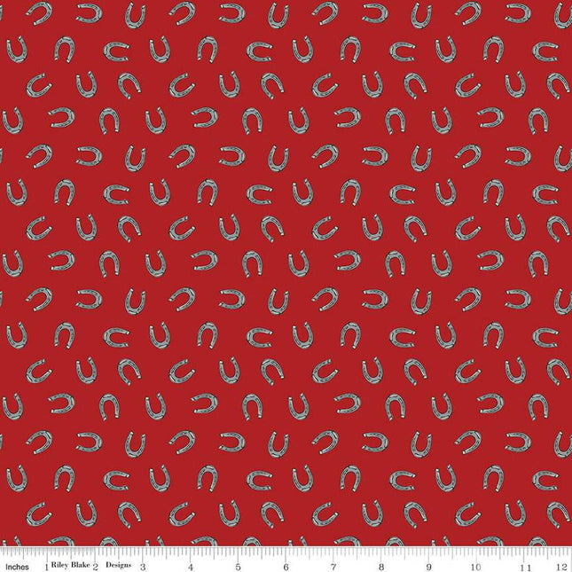 Cowboys Horseshoes Barn Red Cotton Fabric
